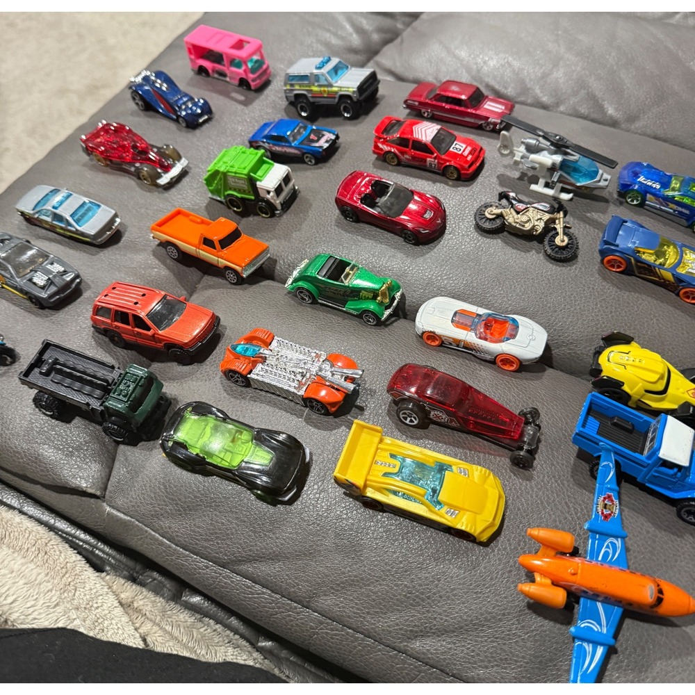 Lot of 28 Matchbox, Hot Wheels, Disney Ramone Muck Bulldozer and Vintage cars.